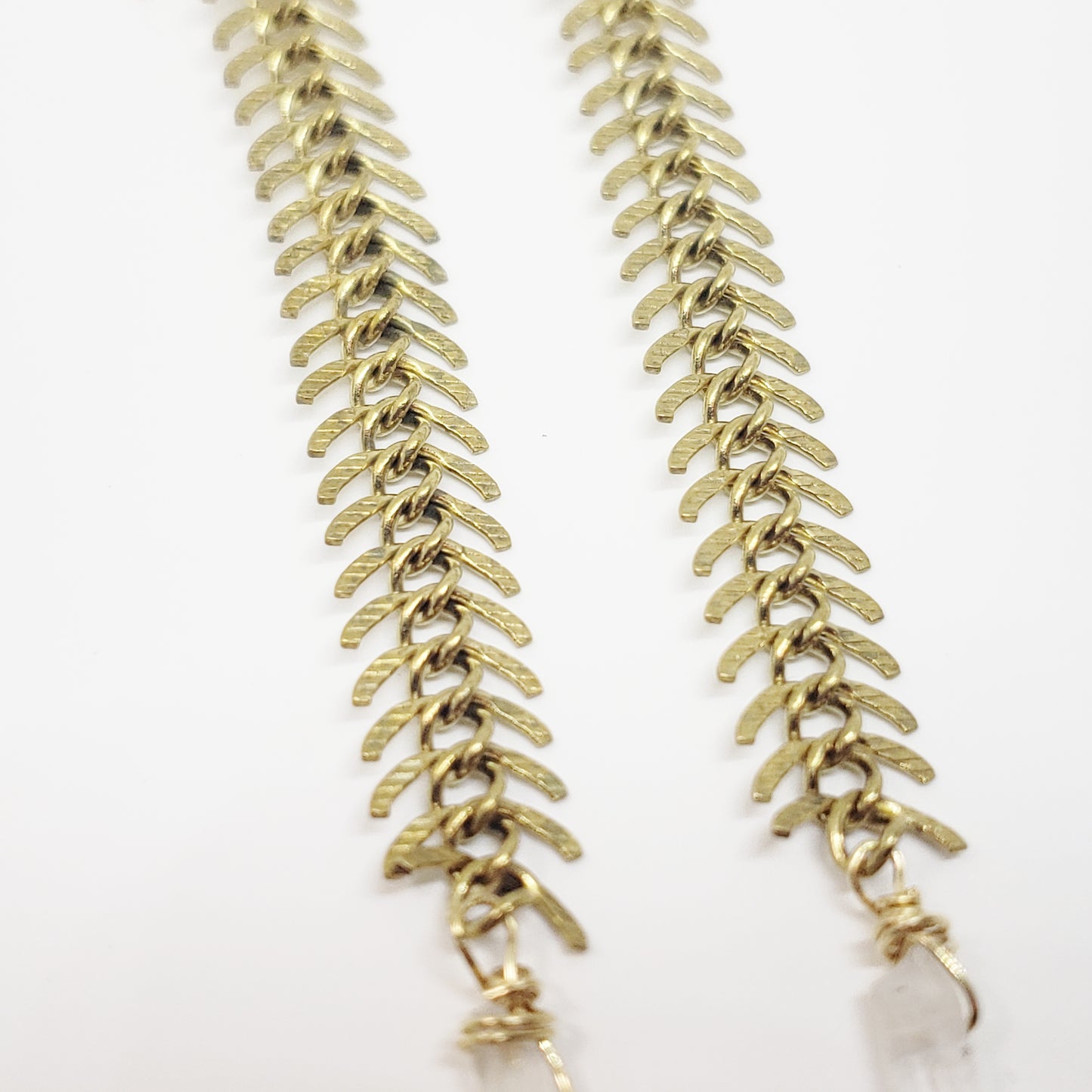 Vertebrae Dangles w/ Clear Quartz